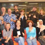 Die Besucher:innen des Netzwerktreffen Essbare Stadt 2024 im Quartiersmanagement Auerberg